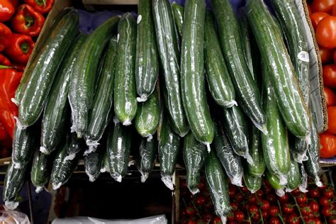 Why Are English Cucumbers Wrapped in Plastic? And Why Do They Taste Like a Rainy Afternoon in London?